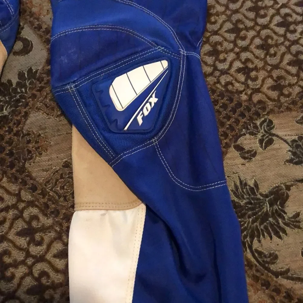 Fox Racing 180 size 30 motorcycle pants one tear
